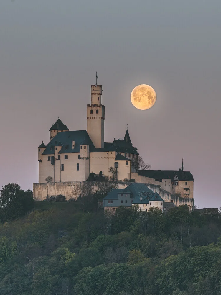 Moonrise above Marksburg, Germany. - Fineart photography by Philipp Heigel
