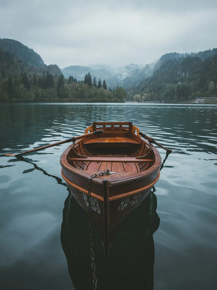 Moody paddles on lake Bled - Fineart photography by Philipp Heigel