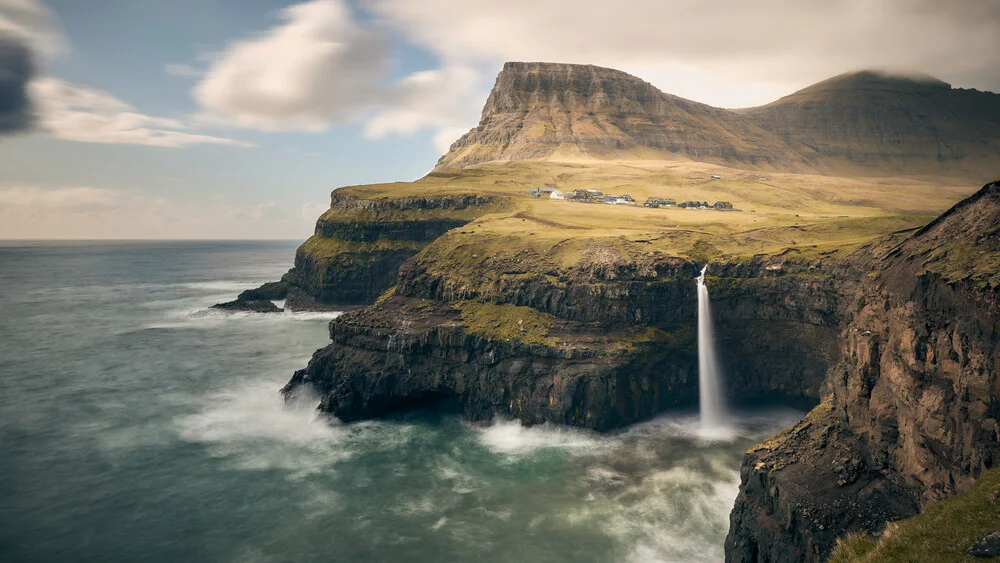 View on Mullafossur Waterfall and Gasadalur village, Faroe Islands - Fineart photography by Norbert Gräf