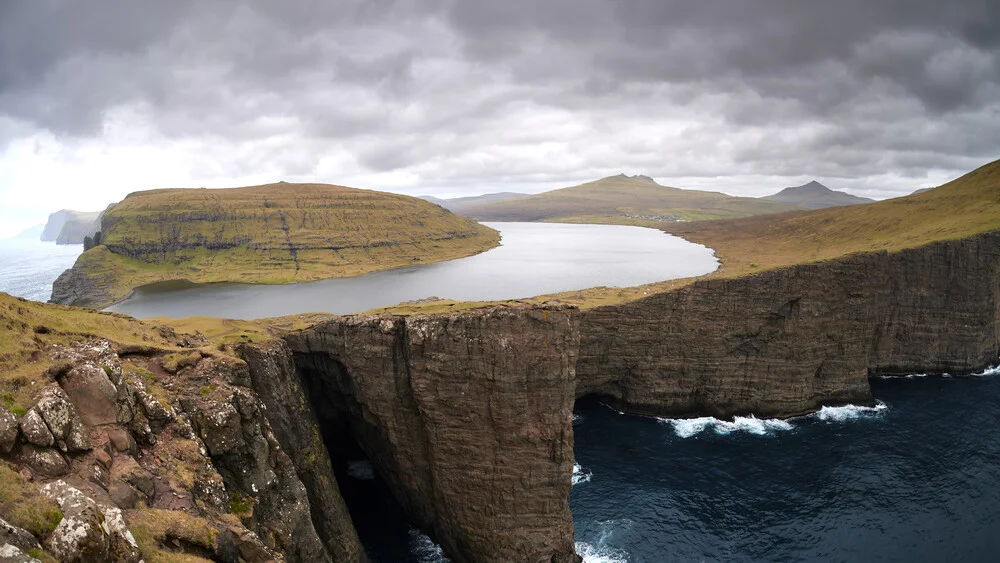 Lake above the ocean, Trælanípa, Faroe Islands in May 2023 - Fineart photography by Norbert Gräf