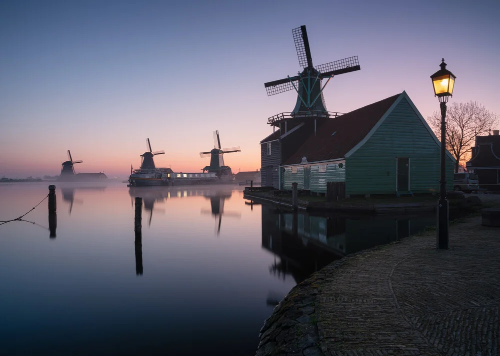 Photo art by Patrick Noack: Morning fog over traditional windmills in the Netherlands