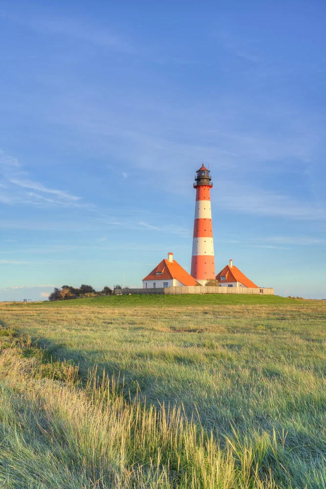 Leuchtturm Westerheversand in der Abendsonne - fotokunst von Michael Valjak