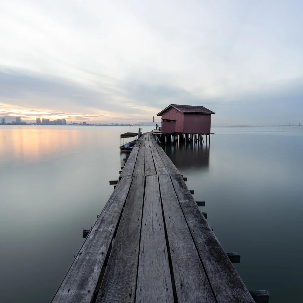 Photo art by Christian Janik: Sunrise over a Malaysian jetty