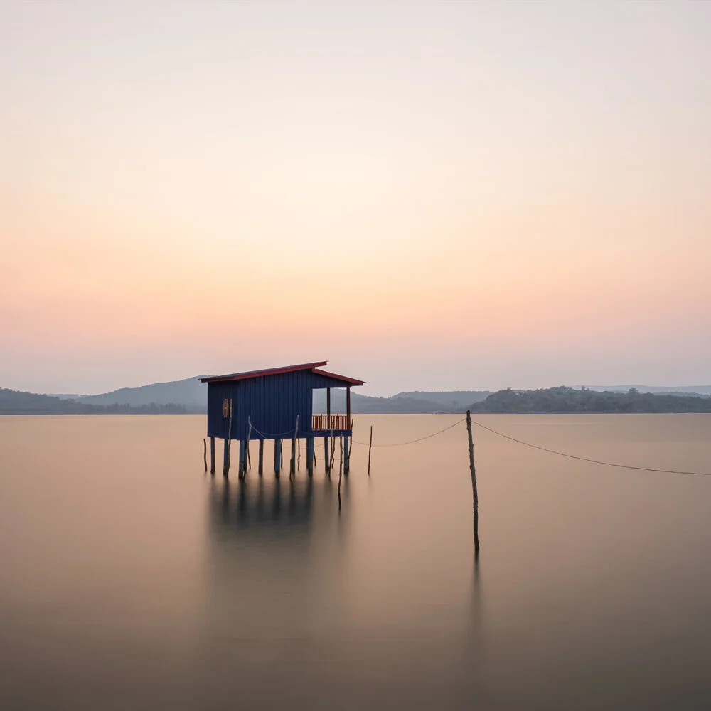 Photo art: fishing hut in a calm setting, soft colors and relaxed mood
