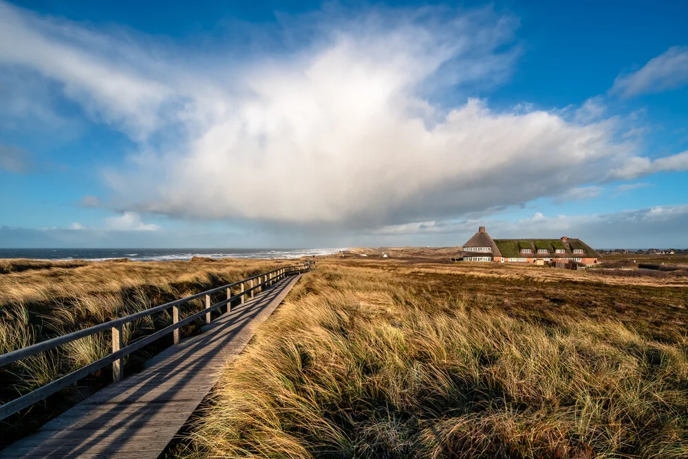 Photo art by Achim Thomae: View of Sylt's coastline, soft clouds above the sea.