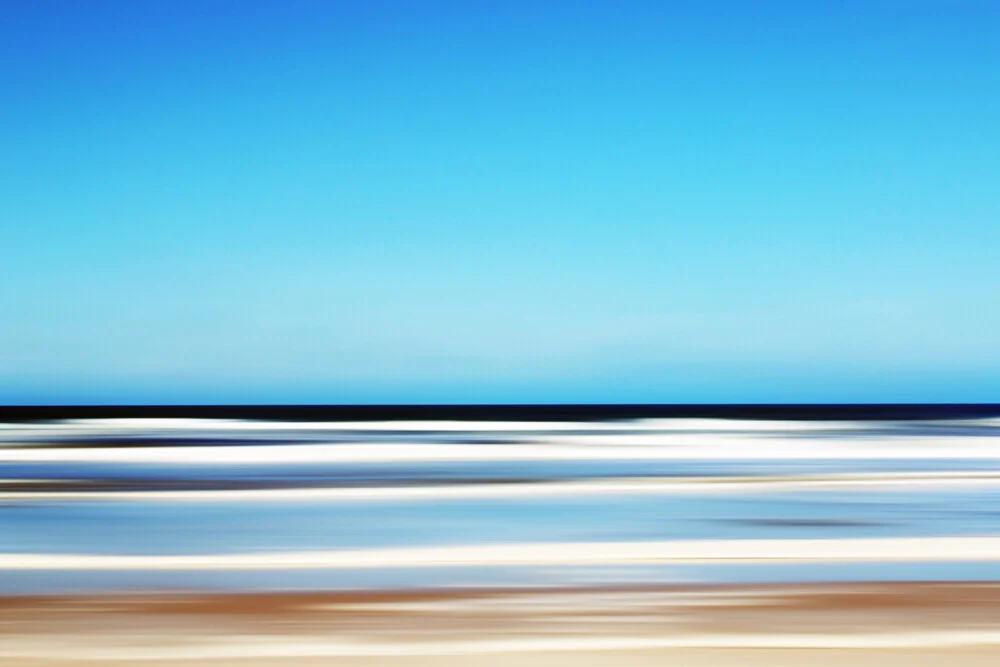Photo art featuring a bright turquoise sea with gentle waves