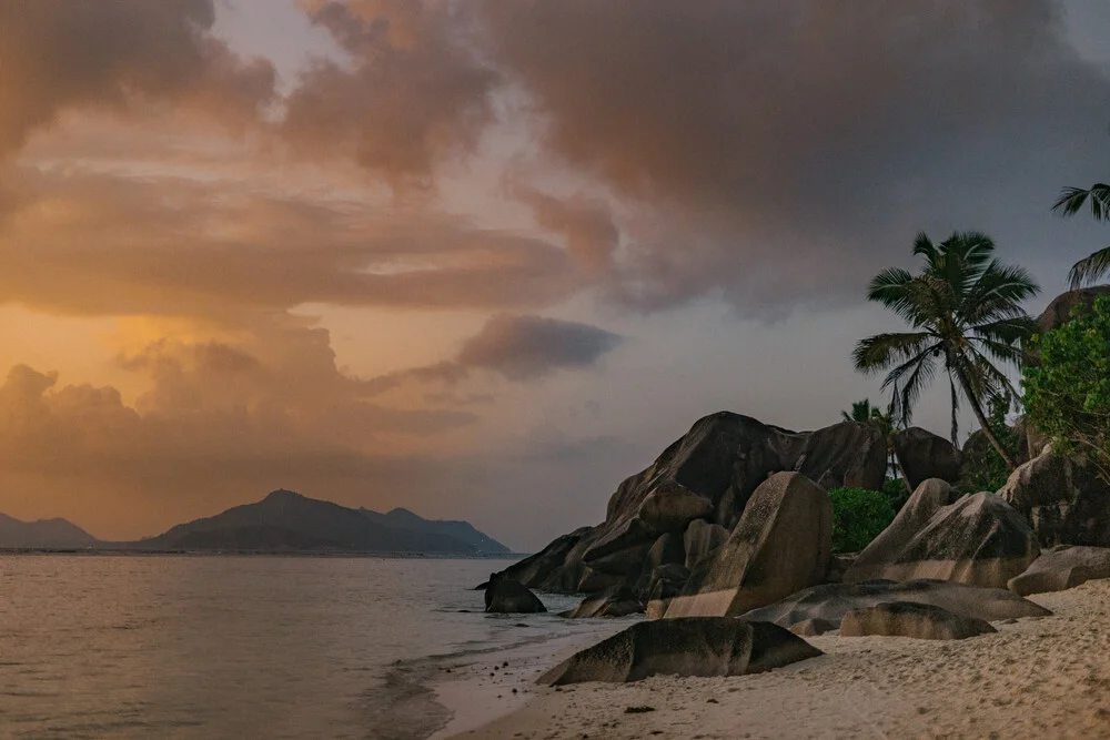 Photo art by Anke Dörschlen: evening mood on La Digue with calm sea and palm trees