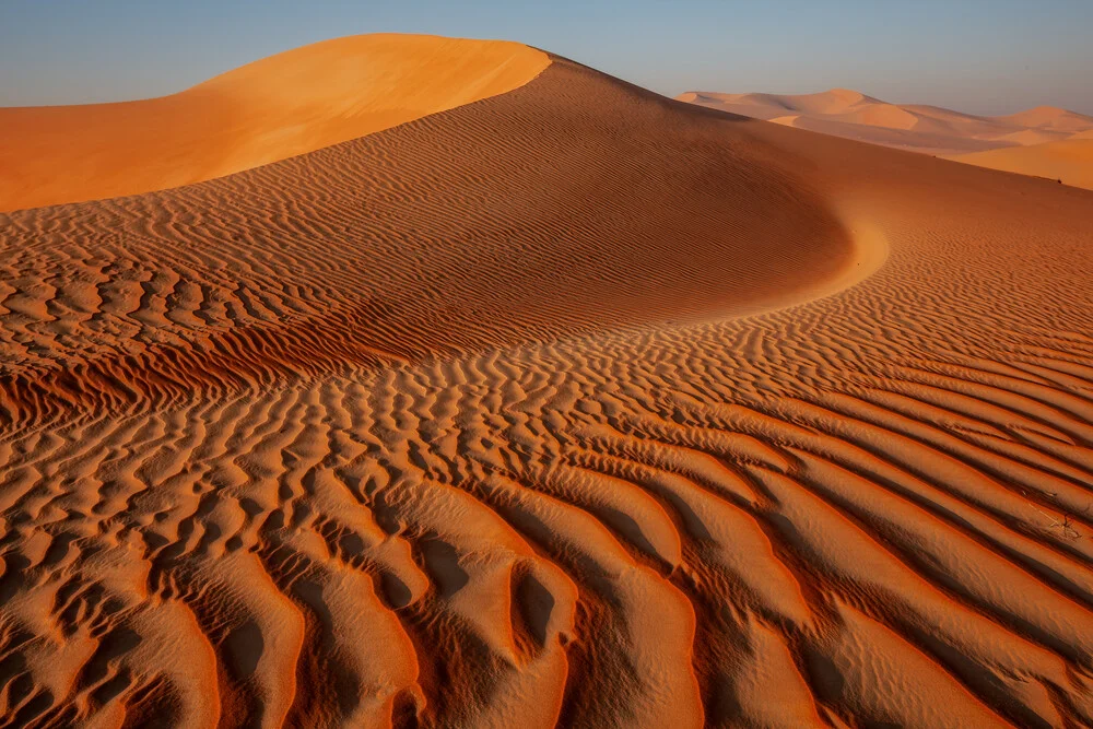 Photo art by Achim Thomae: gentle sunrise over the Rub al Khali Desert