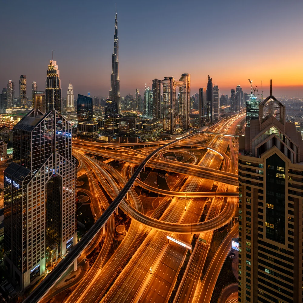 Photo art by Achim Thomae: panorama of the illuminated Dubai skyline at sunset