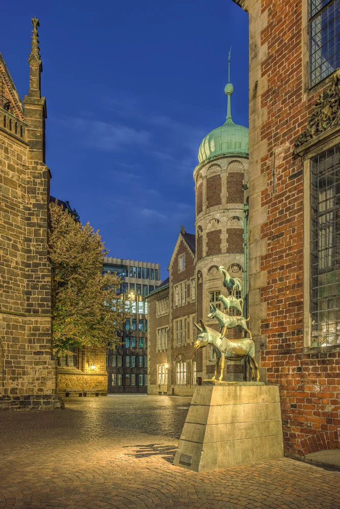 Photo art by Michael Valjak: Bremen Town Musicians in evening light in the old town.