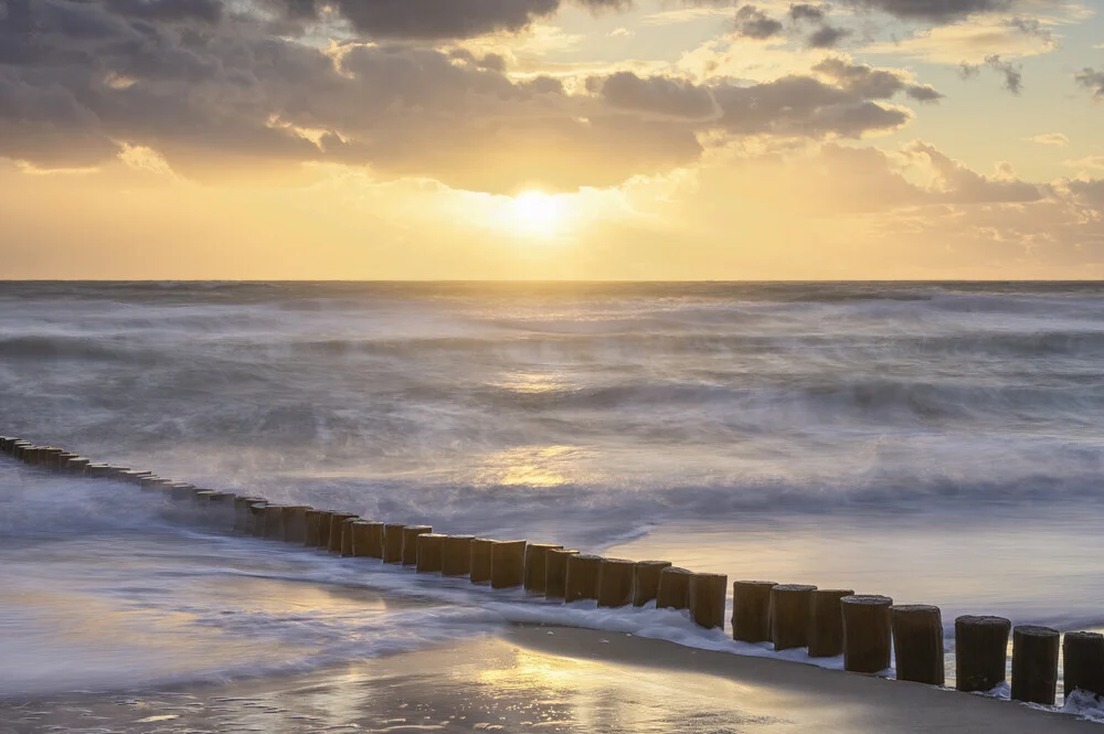Photo art by Rolf Schnepp: moody image of a stormy sunset on the coast.