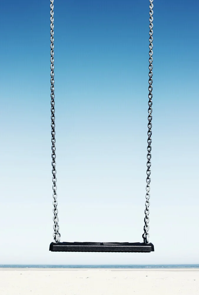 Photo art by Manuela Deigert: swing on the beach with a view of the sky