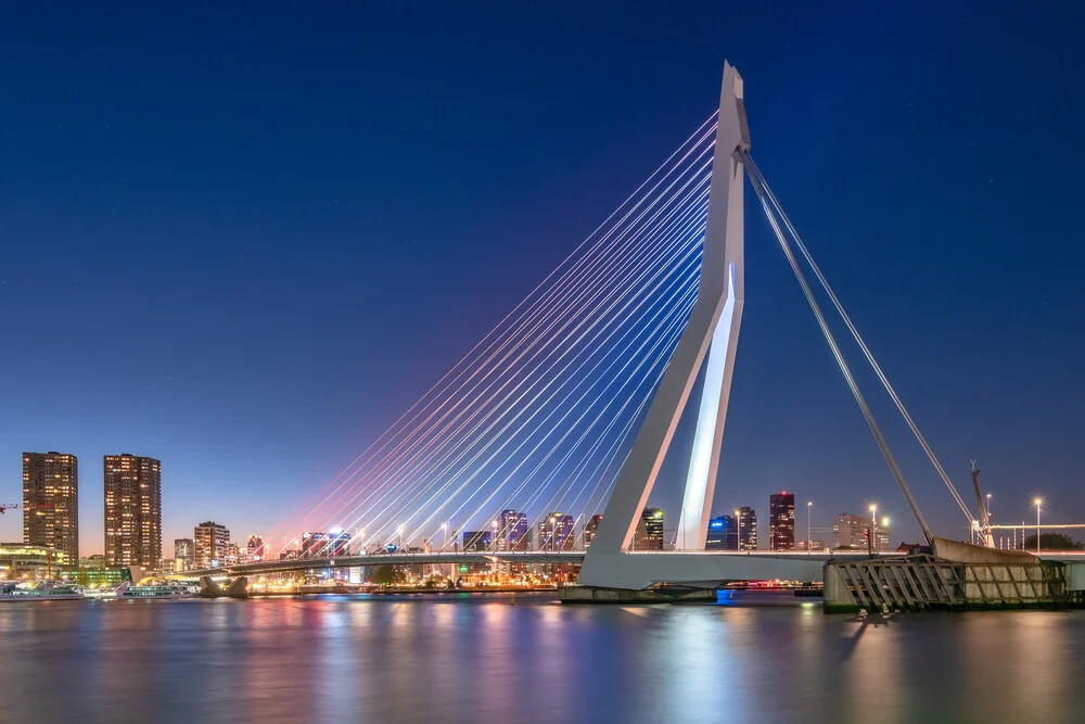 Photo art by Achim Thomae: illuminated Erasmus Bridge in Rotterdam at blue hour.