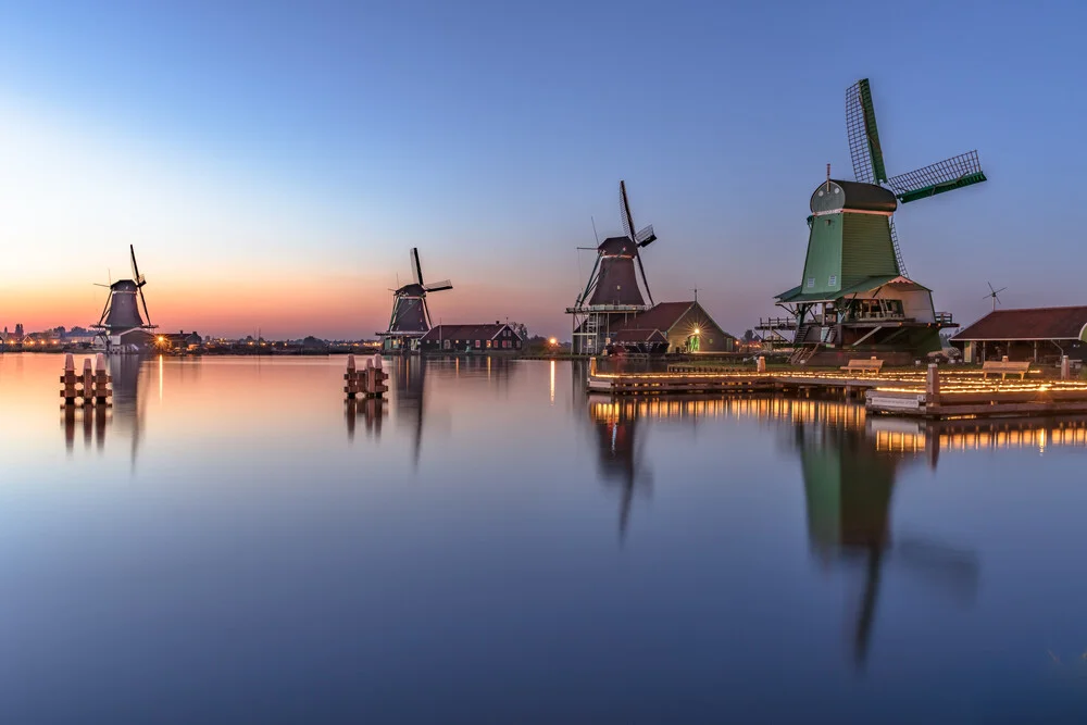 Photo art by Achim Thomae: Windmills at blue hour by the river