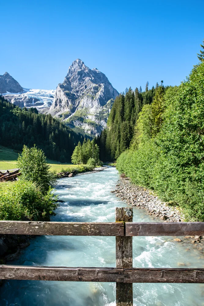 Photo art by Achim Thomae: serene view of the Swiss Alps with a river