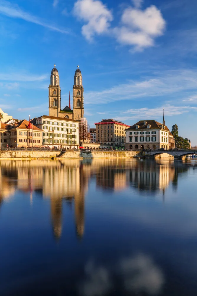 Photo art by Achim Thomae: Grossmünster in Zurich under soft clouds in the sky