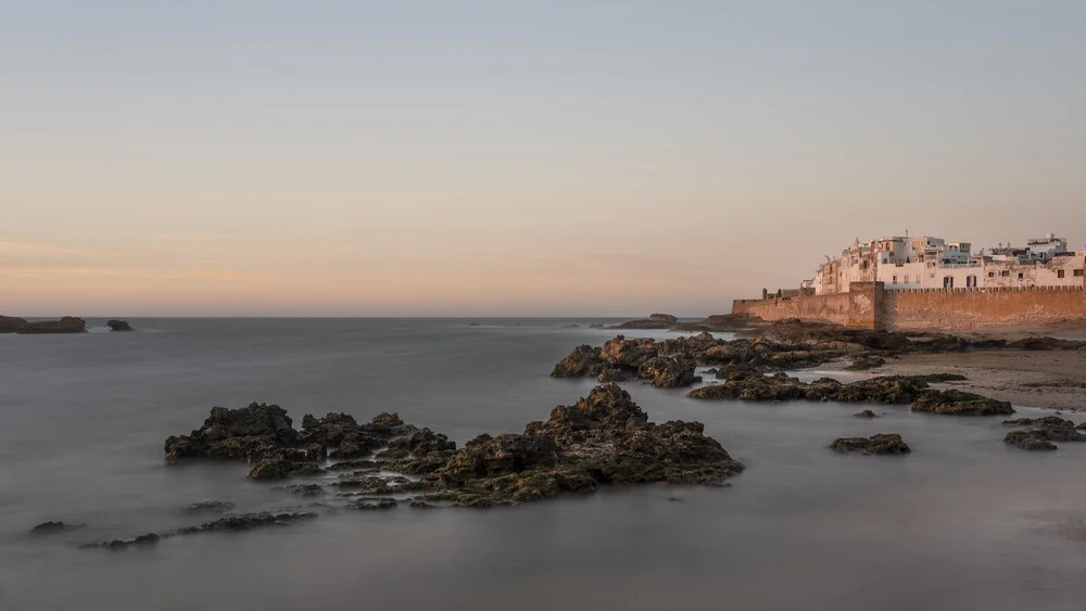 Beautiful sunset over the Atlantic Ocean in Essaouira, Morocco.