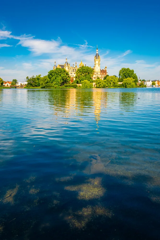 Summer day in Schwerin with a view of the lake and the castle.