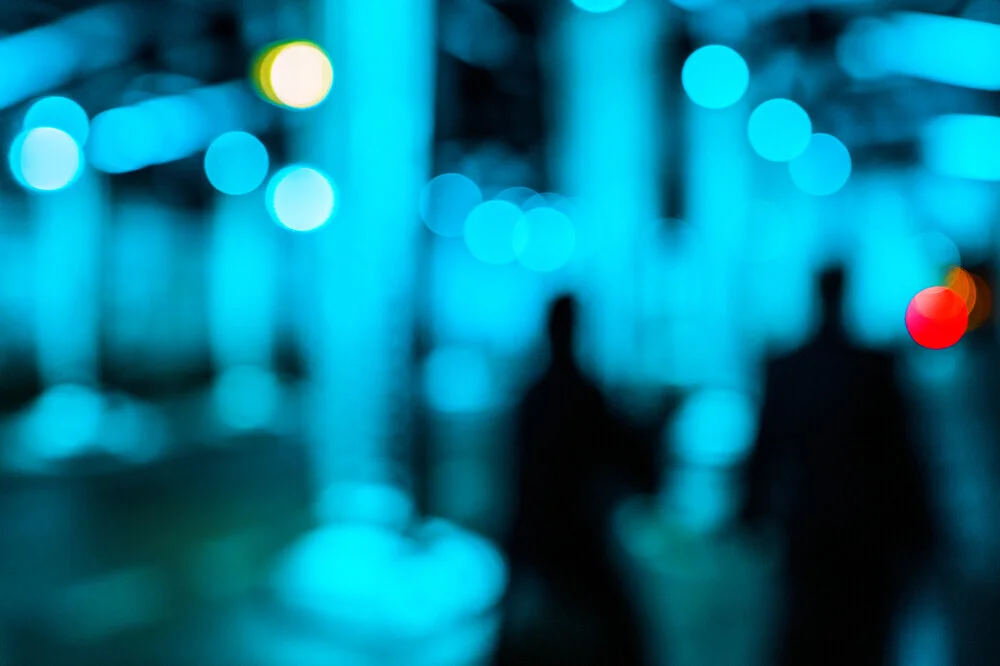 Photo art by J. Daniel Hunger: night city view under a bridge in Cologne.