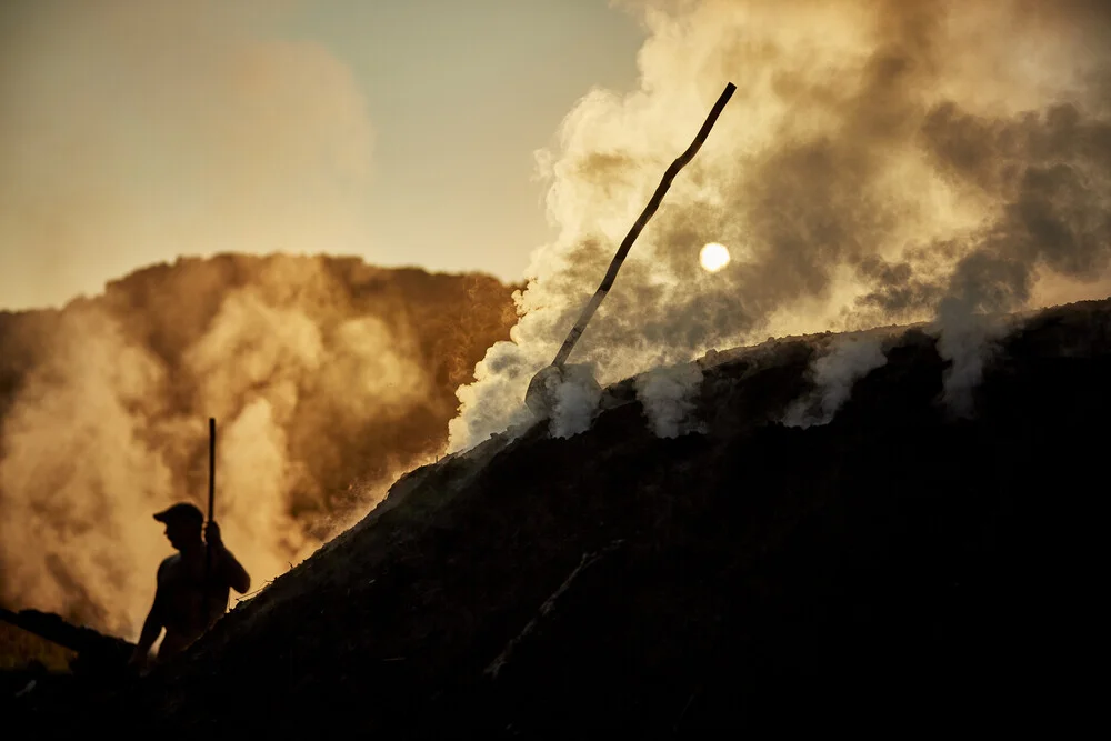 Köhler im Rauch: mystical scene with smoky forests in the Carpathians