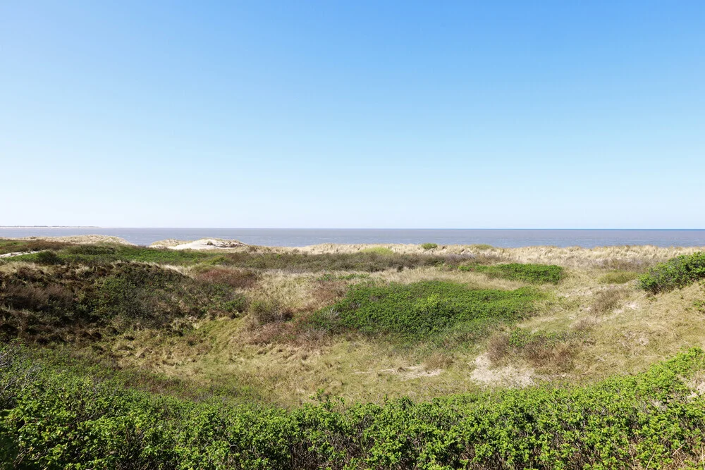 Photo art by Manuela Deigert: calm dune landscape with wide sea view