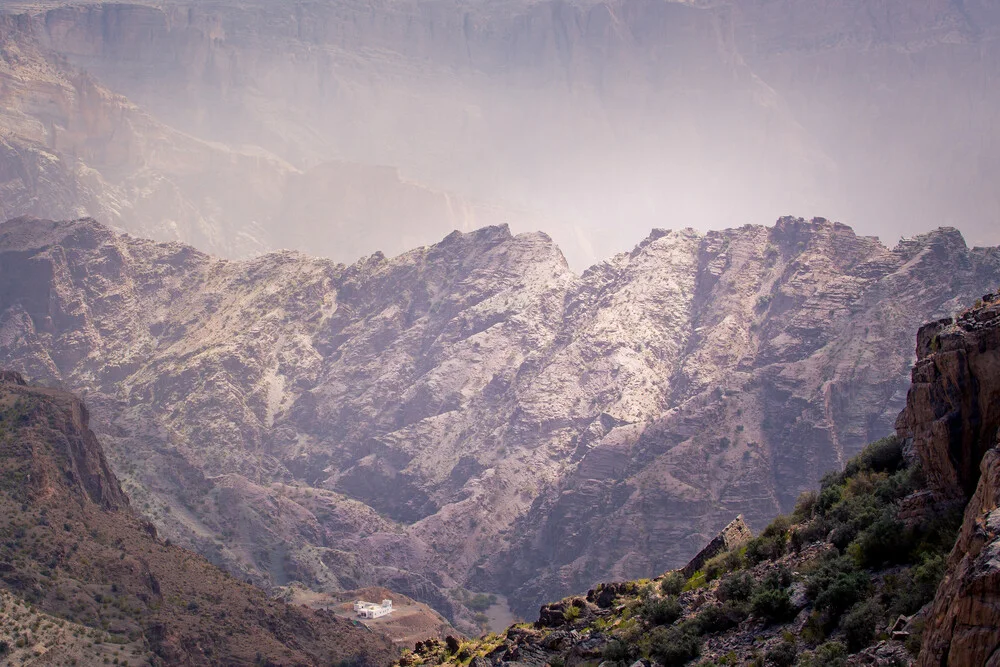 Vast and small - vast mountain and miniature farm - Fineart photography by Eva Stadler