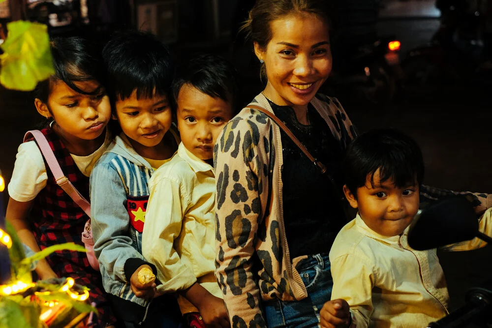 Cambodian family on a motorbike - Fineart photography by Jim Delcid