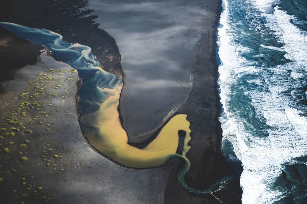 Colored river heading into the ocean in Iceland 2 - Fineart photography by Roman Königshofer