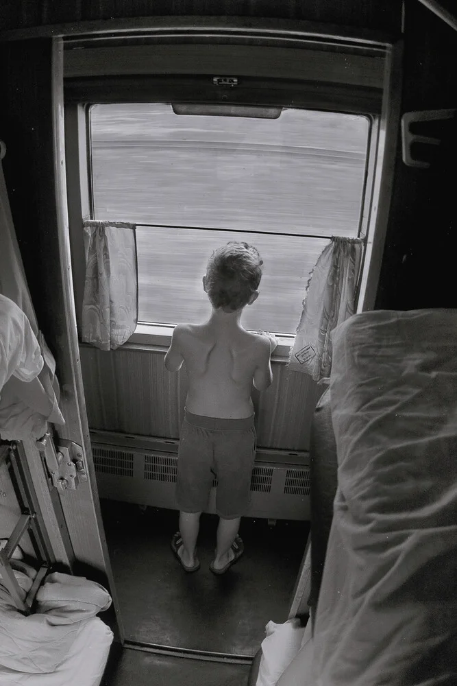 boy at the window - Fineart photography by Oleg Lulev