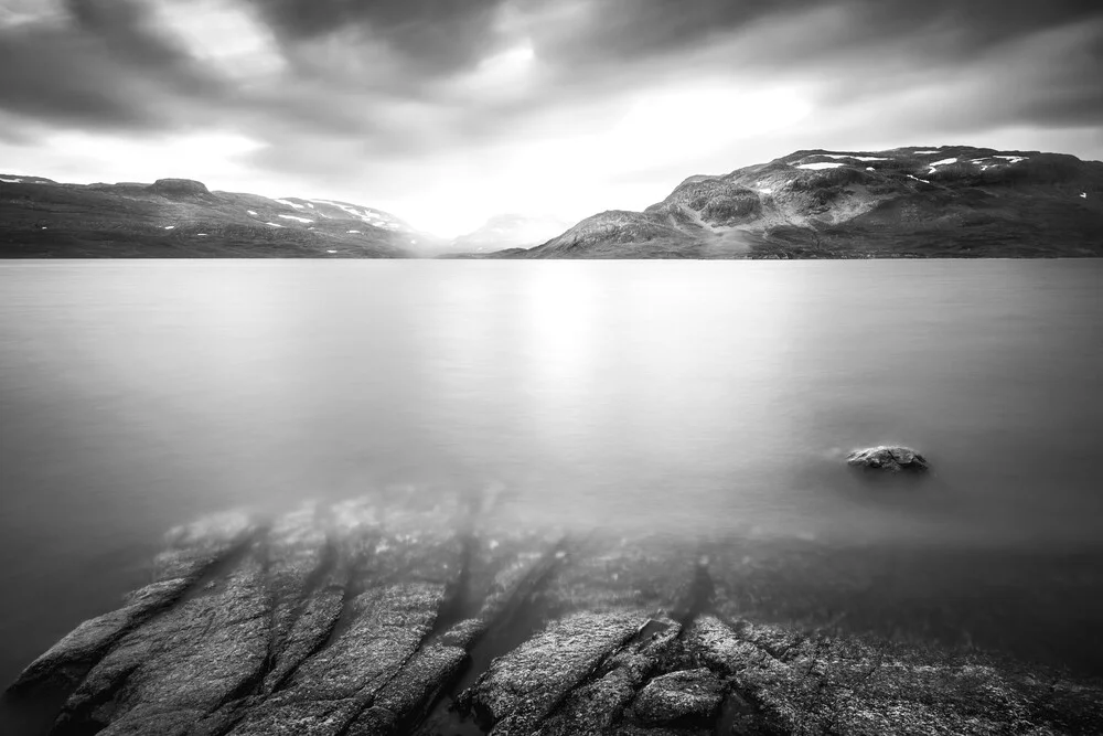 Disappearing rocks in the water - Fineart photography by Felix Baab