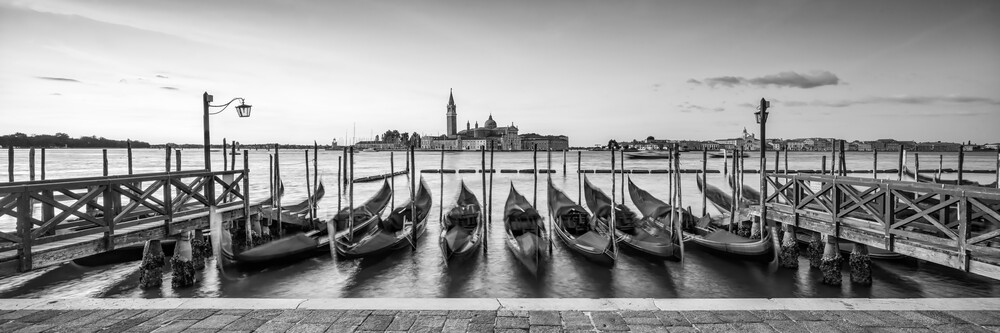 Gondolas on the pier in Venice - Fineart photography by Jan Becke