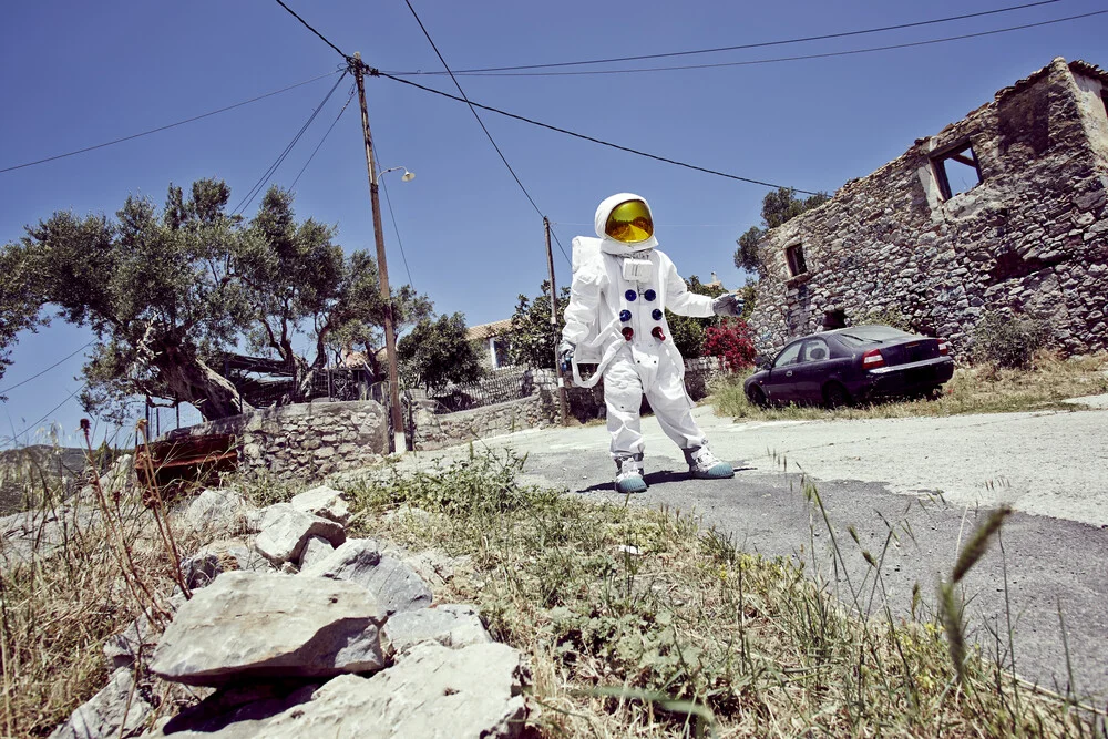 The Protestonaut in a deserted village - Fineart photography by Sophia Hauk