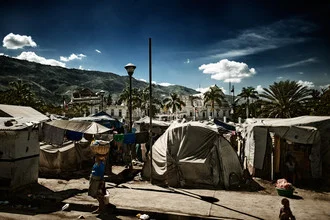 Photo art by Frank Domahs: Ruins of the presidential palace in Port-au-Prince with tents