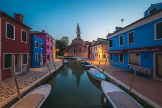 Photo art by Jean Claude Castor: calm canal view in Burano at night.