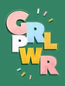 Cheerful wall art featuring colorful letters and a strong girl illustration.