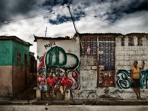 Photo art by Frank Domahs: colorful graffiti on a street in Sité Soley, Port-au-Prince.