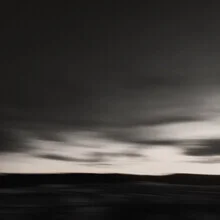 Black and white photo art: minimalist landscape with clouds and sea