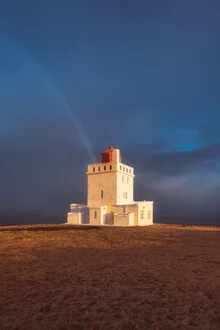 Photo art by Jean Claude Castor: Dyrholaey lighthouse with rainbow in Iceland