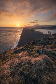 Photo art by Jean Claude Castor: Sunset over Dyrhólaey coast in Iceland.