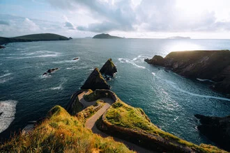 Photo art by André Alexander: waves and cliffs at sunset in Ireland