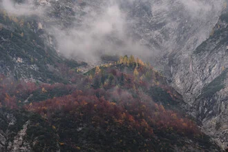Photo art by Klaus Bernhard: rocks surrounded by autumn colors and fog