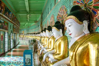 Photo of a Buddha exuding calmness in soft colors