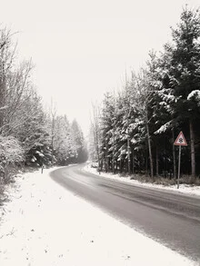 Photo art by Lena Weisbek: Wintery tree landscape with a snow-covered street