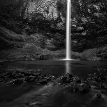 Photo art by Christian Janik: waterfall in New Zealand surrounded by lush greenery