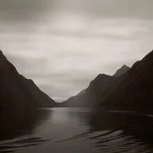 Photo art by Lena Weisbek: serene view of Lake Königsee in black and white