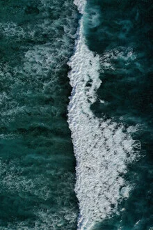 Photo art depicting gentle ocean waves in radiant blue hues.