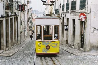 Photo art by Kathrin Schabelski: the Elevador da Bica in vibrant Lisbon streets