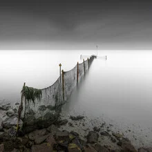 Photo art by Ronny Behnert: fishing net in calm water near Sylt