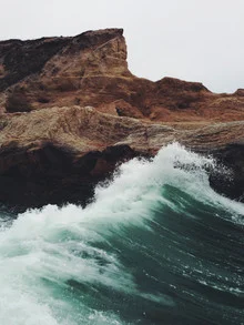Photo art by Kevin Russ: gentle ocean wave along the California coast