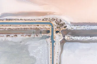 Aerial view of a salt extraction site in France, soft colors and abstract patterns